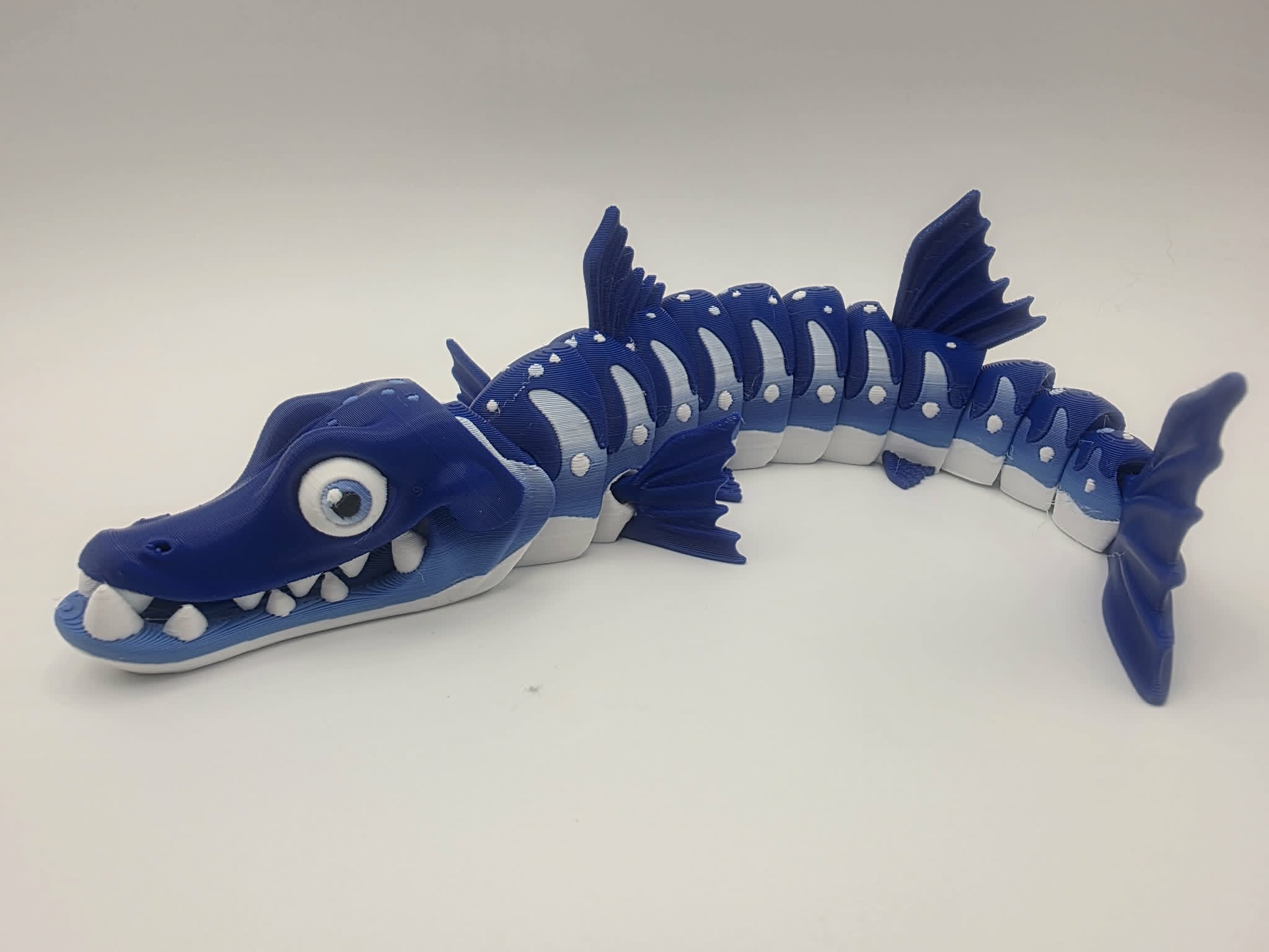 Barracuda - Bluewater - 8.5" Long x 2.25" Tip of Fin to Tip of Fin x 1.5" Tall - Blue and White, White, Blue, Black 3D printed item image