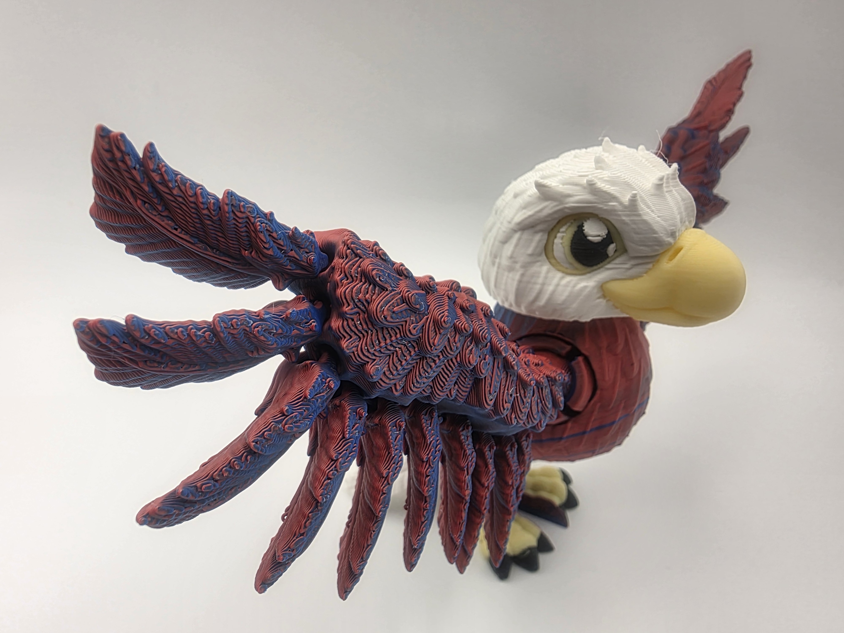 Eagle - Freedom Flyer - 3.25" Tall x 2.5" Chest to Tail x 7" Wing Spread - Red & Blue, Lemon Yellow, White, Black 3D printed item image