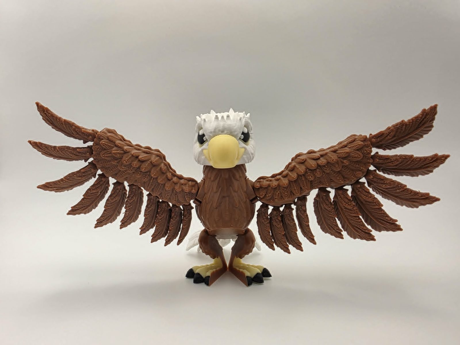 Eagle - Freedom Eagle - 3.25" Tall x 2.5" Chest to Tail x 7" Wing Spread - Chocolate, White, Lemon Yellow, Black 3D printed item image