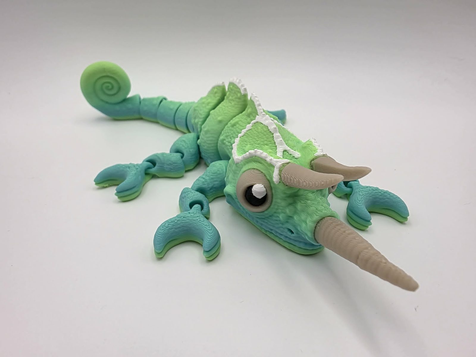 Chameleon - Citrus Splash - 7.5" Long x 3" Wide Elbow to Elbow x 1.5" Tall - Matte Yellow Green Rainbow, White, Bone White, Black 3D printed item image