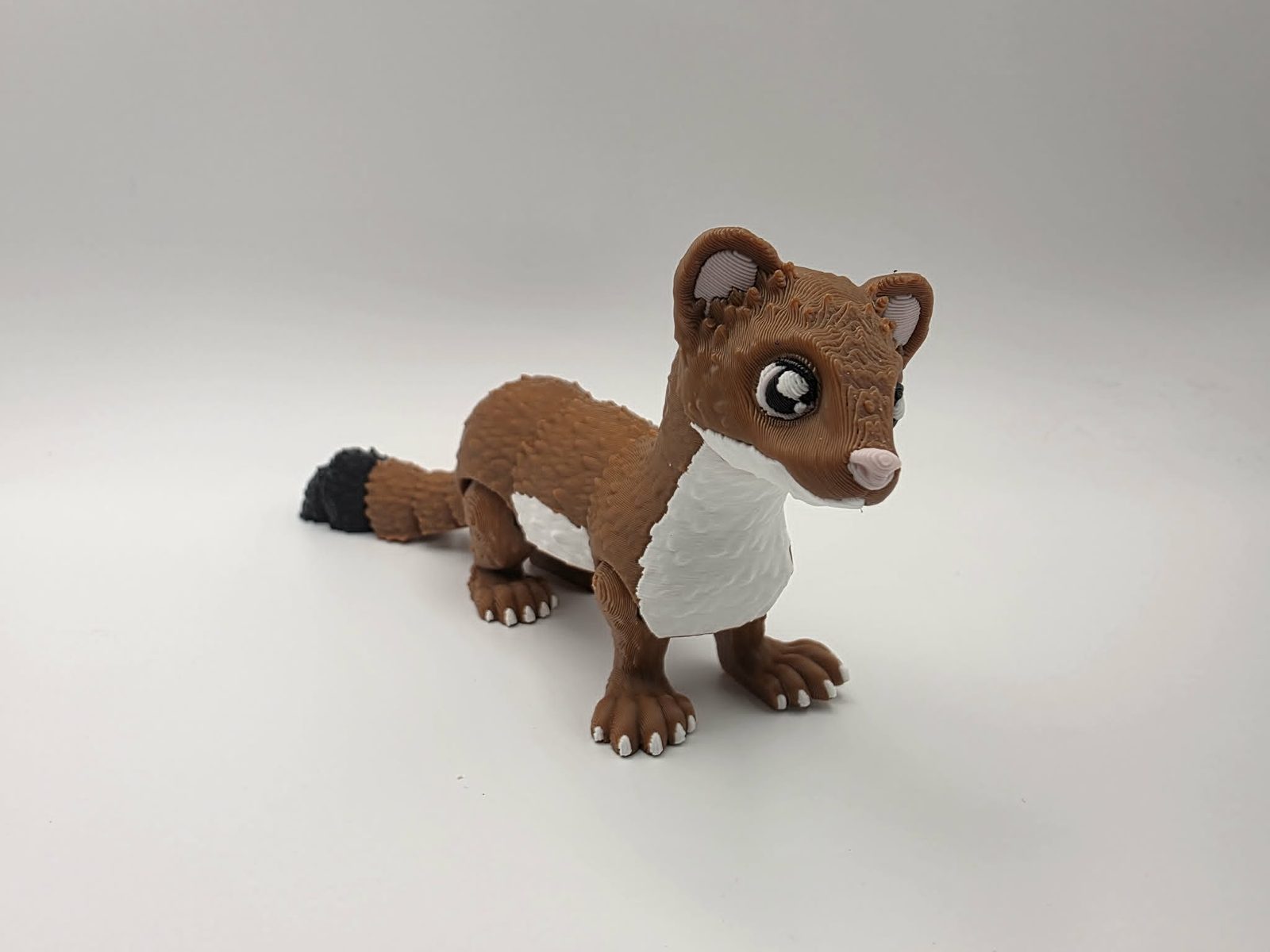 Weasel - Rusty Rascal - 6" Long x 1" Wide x 2.75" Tall - Chocolate, White, Black, Sakura Pink 3D printed item image
