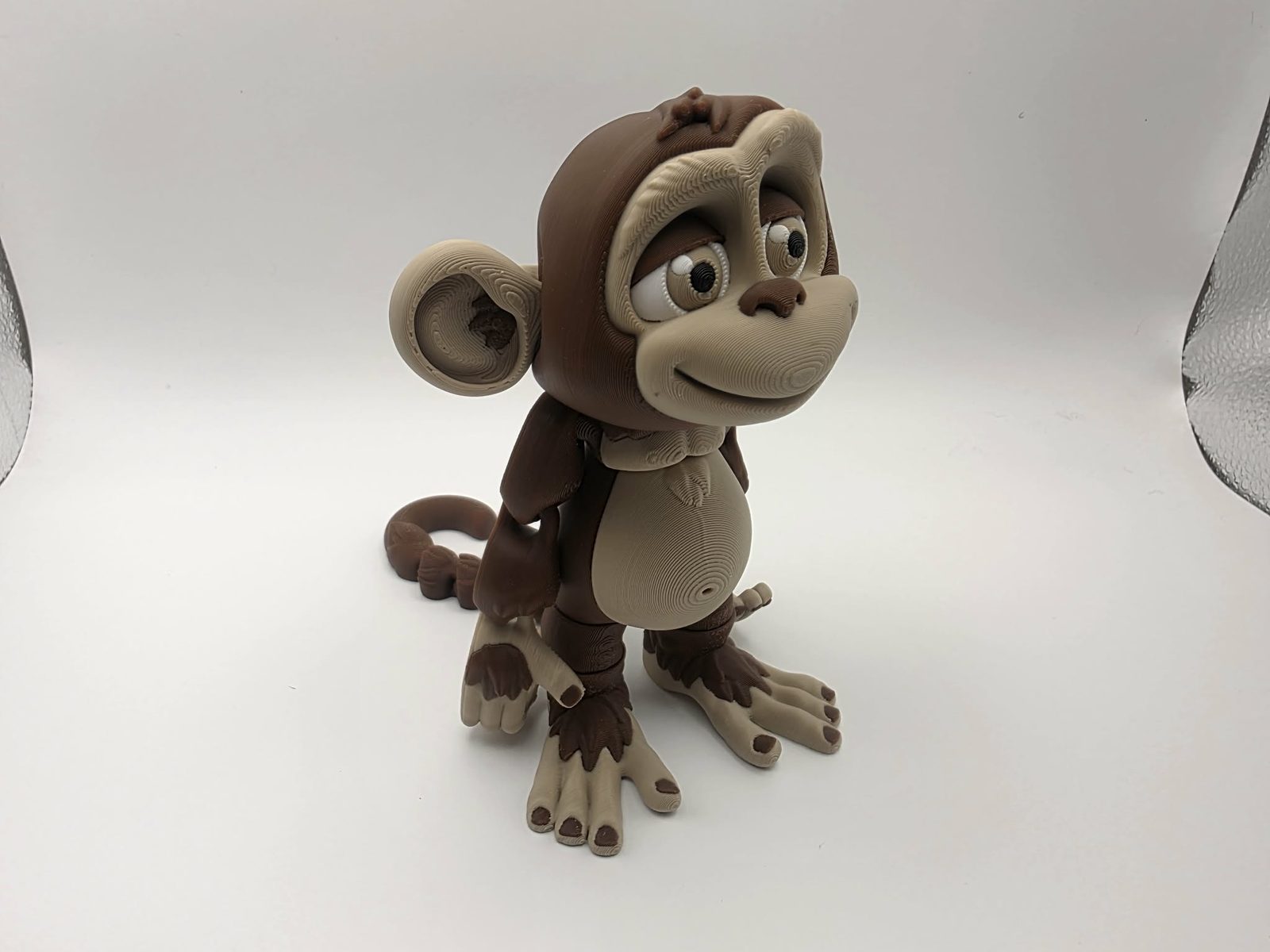 Monkey - Mischief Monkey - 5.5" from Tip of Toe to End of Tail x 4" Wide x 5.25" Tall - Coffee Brown, Matte Light Brown, White, Black 3D printed item image