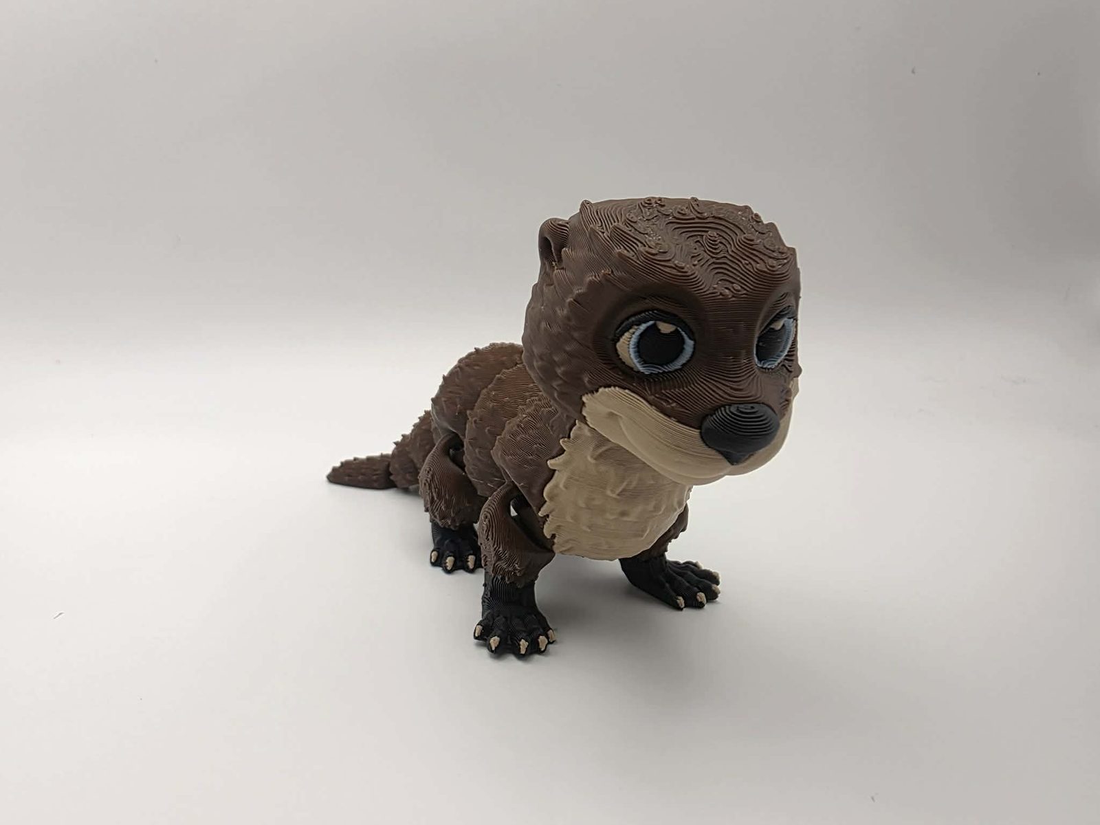 Otter - Wiggle Whiskers - 5.5" Long x 1.5" Wide x 2.5" Tall - Chocolate, Matte Light Brown, Black, Light Blue 3D printed item image