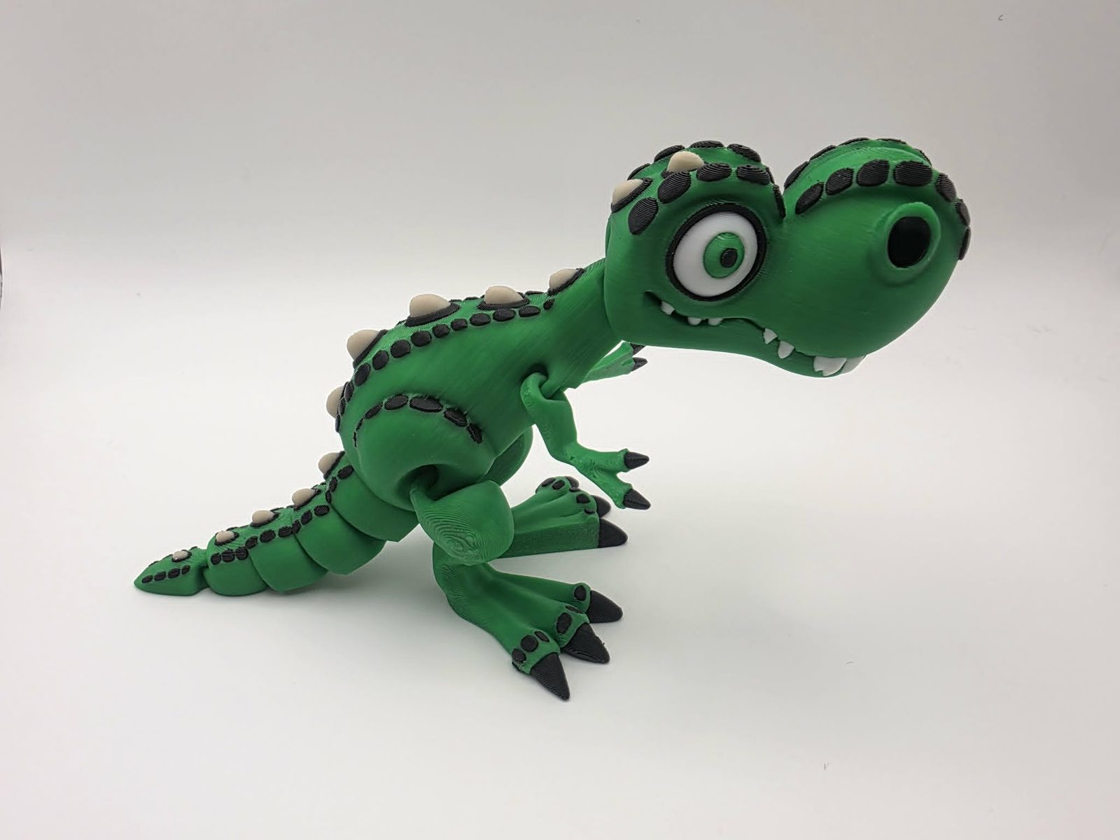 T-Rex - Rexy Roar - 6" Long x 2" Wide x 4" Tall - Green, Black, White, Bone White 3D printed item image