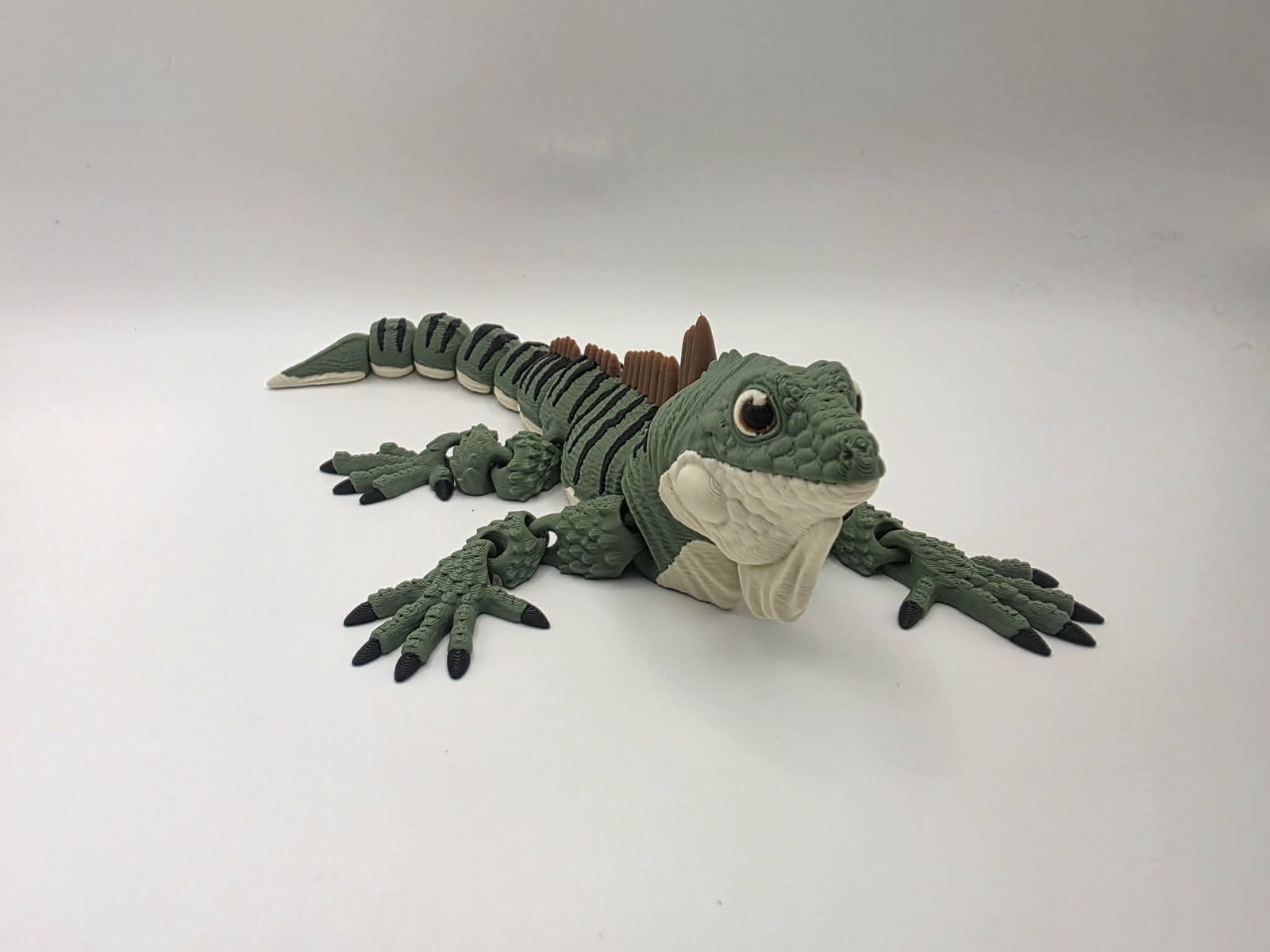Iguana - Ridgeback - 8.5" Long x 3.5" Wide Elbow to Elbow x 2" Tall - Olive Green, Black, Bone White, Chocolate 3D printed item image