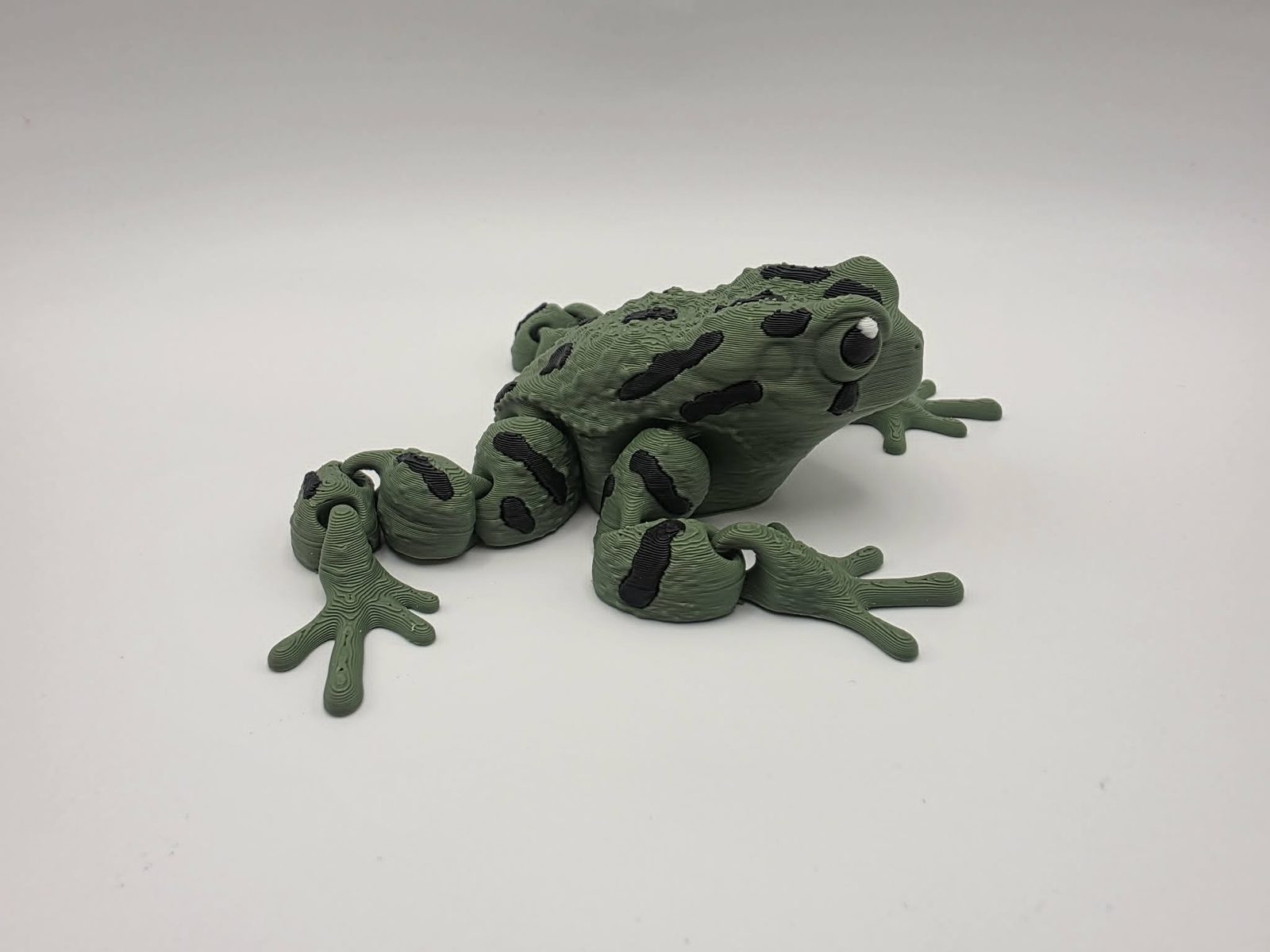 Toad - Puddle Hopper - 3.5" Long x 4.25" Wide x 1.25" Tall - Matte Olive Green, Black, White 3D printed item image