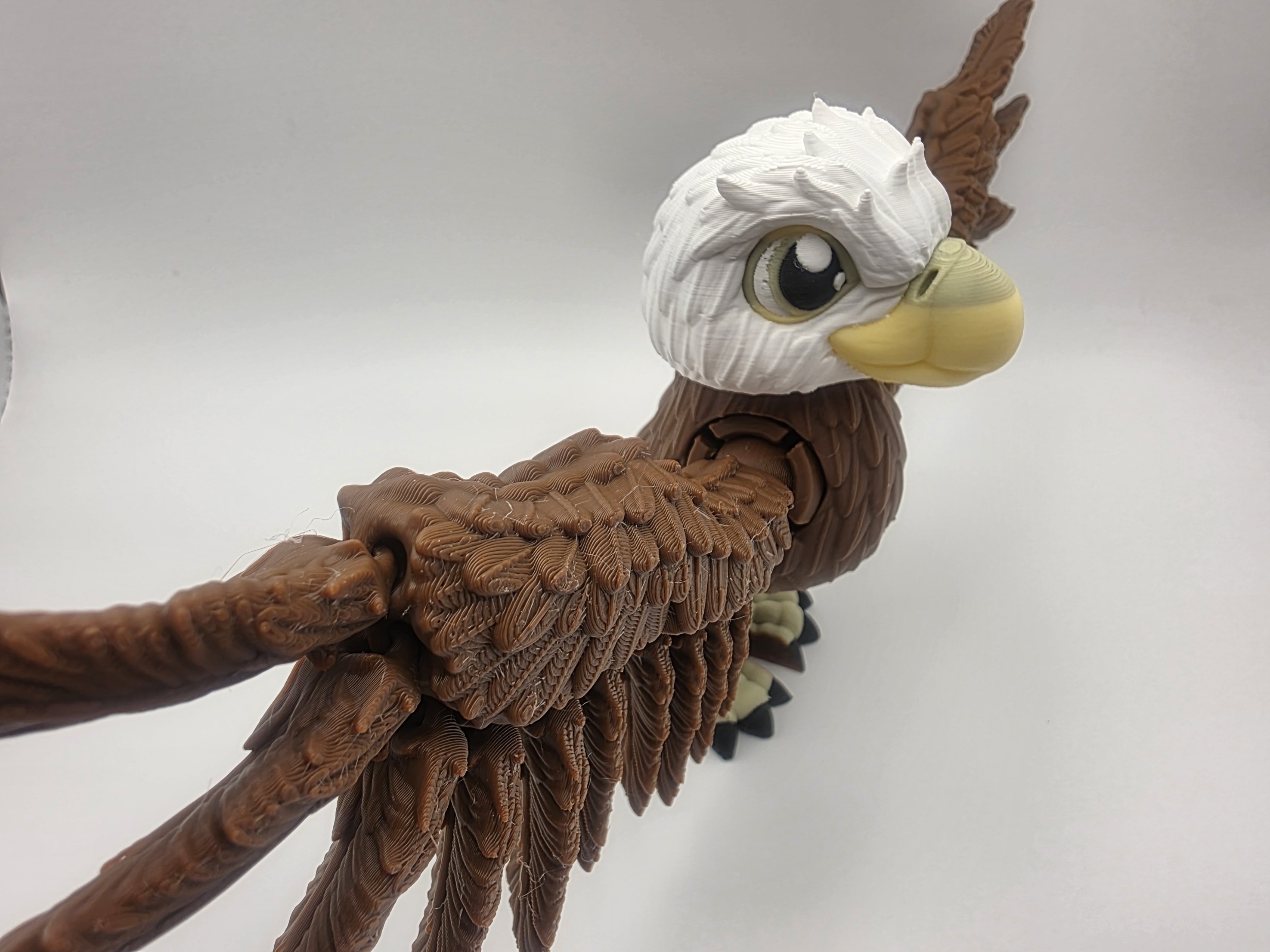 Eagle - Castle Country - 4" Chest to Tail x 5" Tall x 9.5" Wing Spread - Chocolate, Lemon Yellow, White, Black 3D printed item image