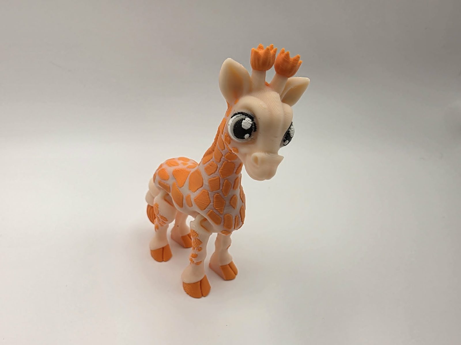 Baby Giraffe - Creamsicle Baby Giraffe - 2.75" Long x 1" Wide x 3.5" Tall - Beige, Sunny Orange, White, Black 3D printed item image