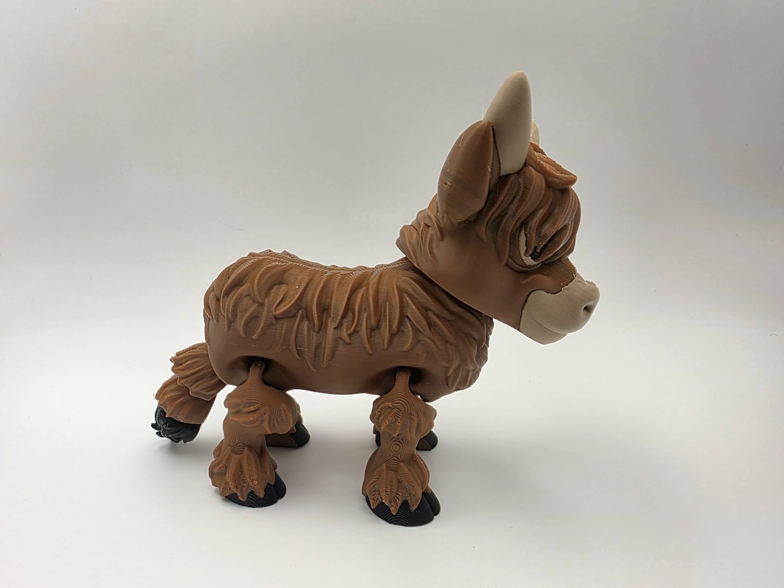 Highland Cow - Butterscotch Moo - 5.25" Long x 1.75" Wide x 4" Tall - Chocolate, Black, Matte Light Brown, Light Blue 3D printed item image