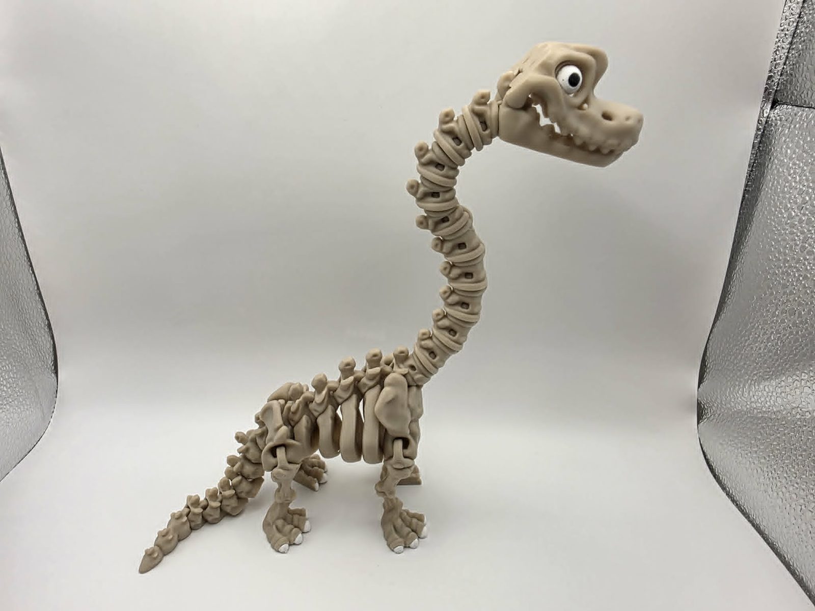 Skeleton Brachiosaurus - Stretch - 9.5" Long x 2.25" Wide x 9" Tall - Bone White, White, Black 3D printed item image